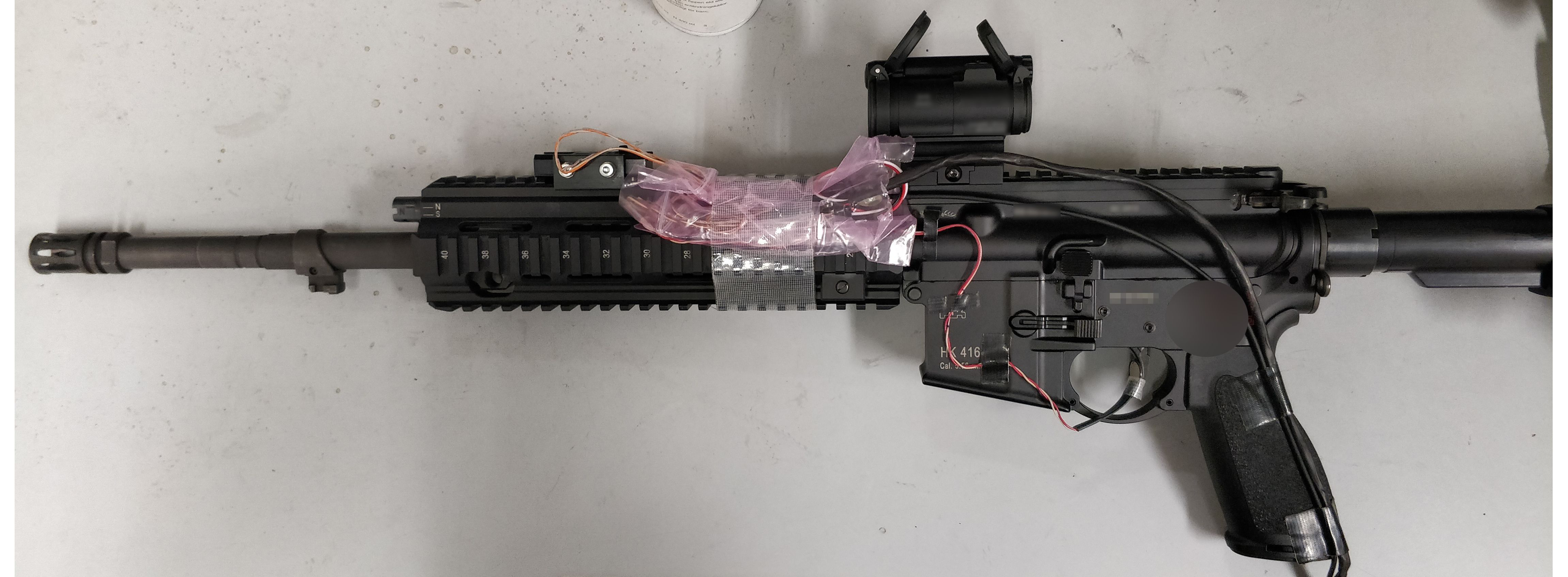 HK416. The HK416 semi-automatic rifle (5.56 mm × 45 calibre) used in the data collection scenario.