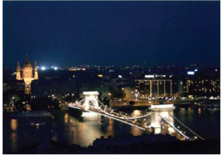 Budapest at night. Bridge over the Danube River connecting Buda and Pest. The cables between the two main supports are in the shape close to the catenary. Photo: M. Sapagovas.
