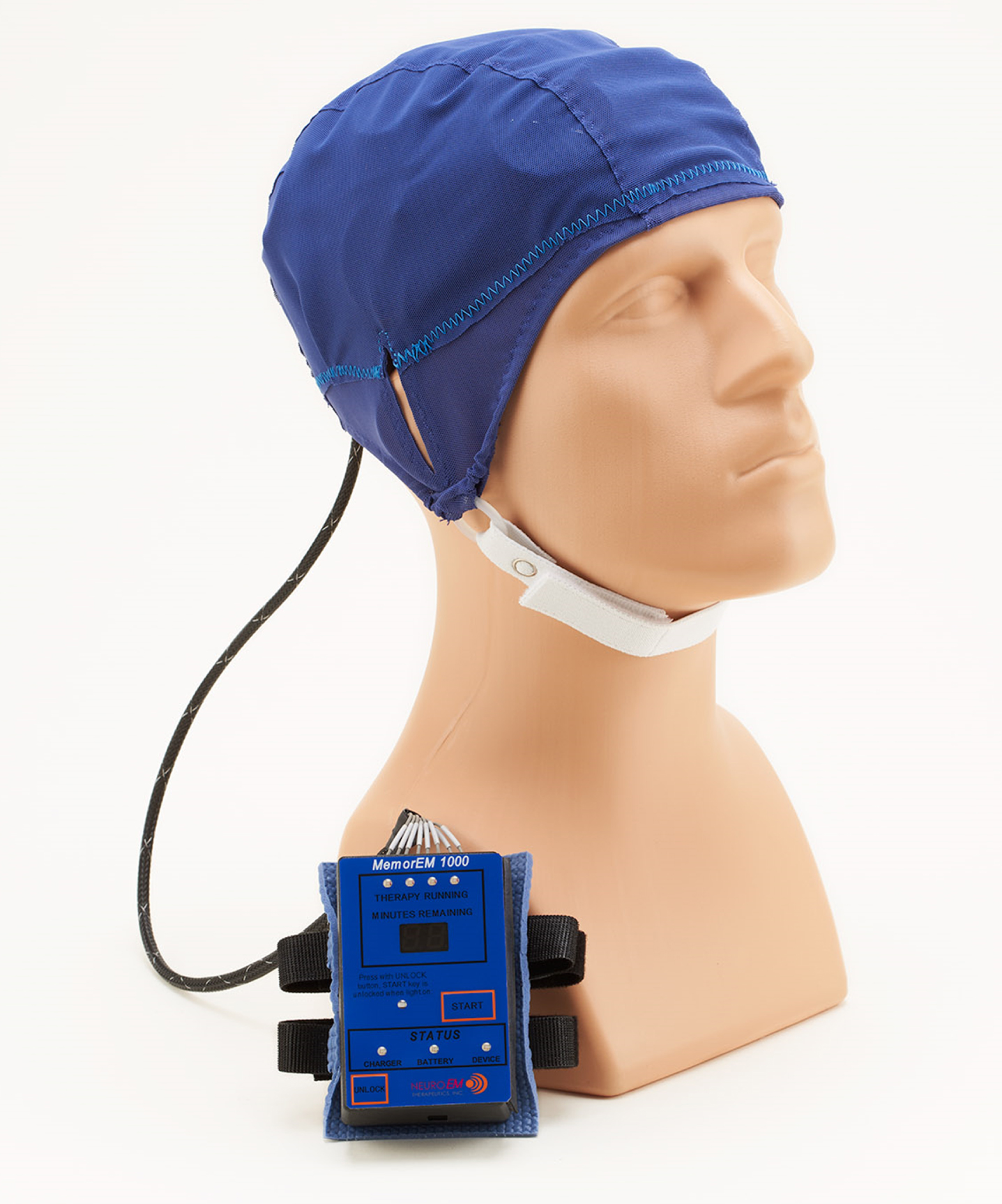 A MemorEM device being worn by a mannequin human head. The control panel/battery box is worn on the subject’s upper arm and is wired via a cable to eight radiofrequency wave emitters (four on each side of the head) embedded between the device’s two-layered head cap. Emitters collectively provide full forebrain TRFT, while allowing near complete mobility during any given 1-hour treatment.