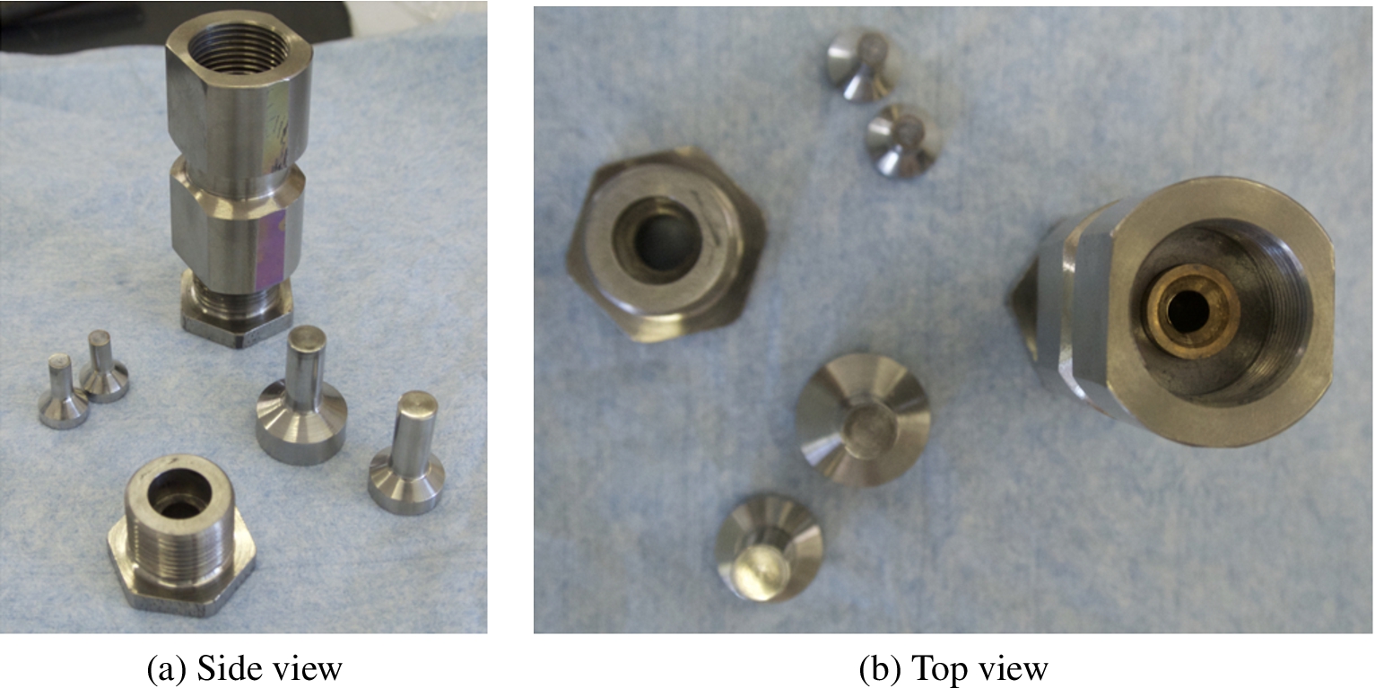 Photographs of the pressure cell, nuts and pistons.
